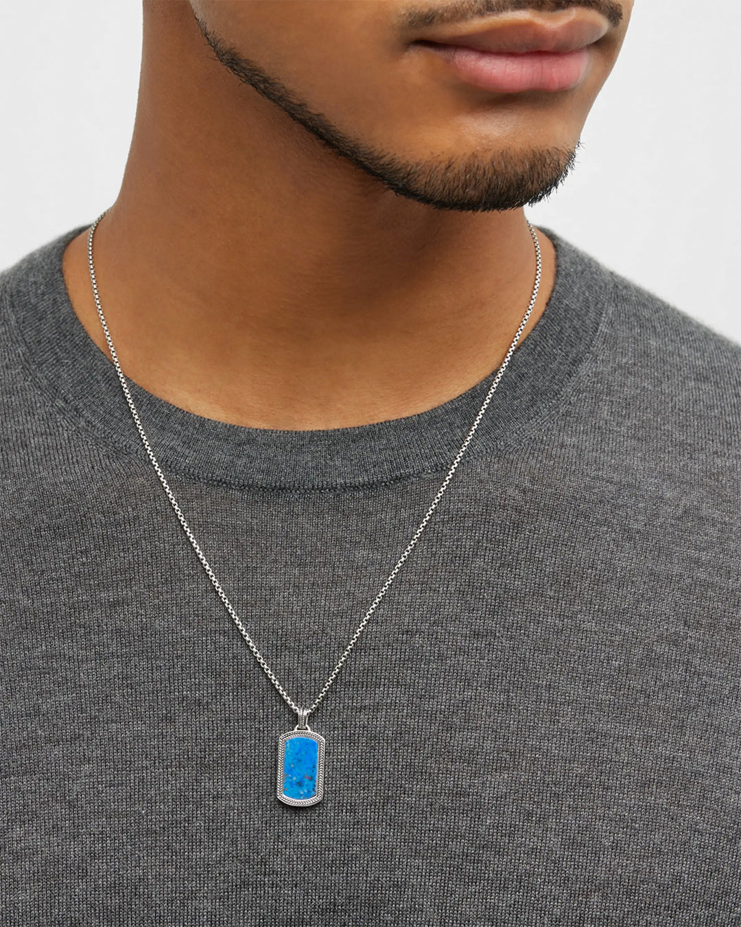 Male model wearing the Lapis Gemstone Plaque Sterling Silver Pendant Necklace. 