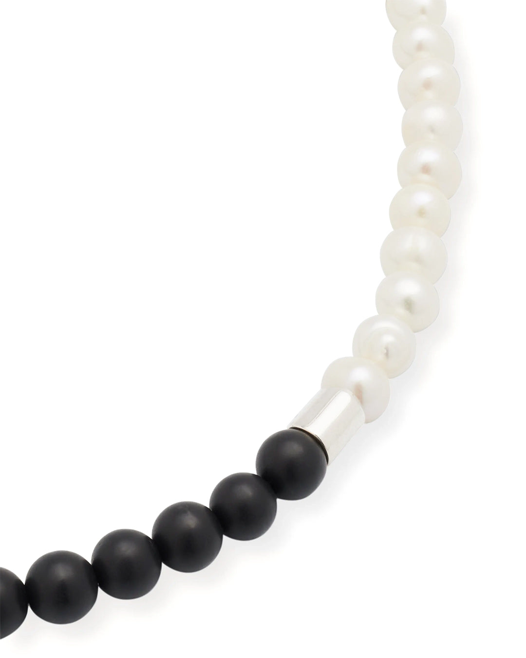 Close up of the matte black agate beads, sterling silver spacer, and freshwater pearls. 