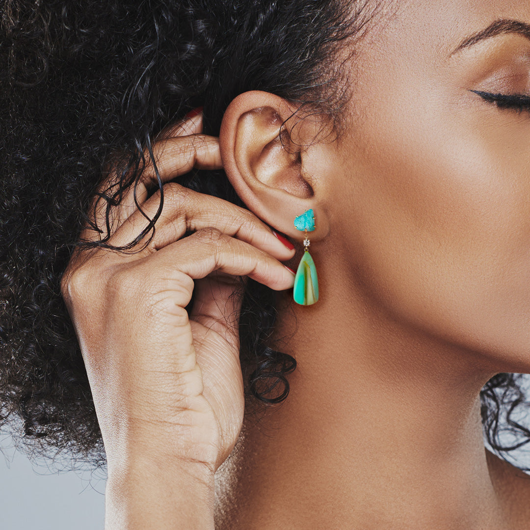 Model wearing the Antigua 18K Gold One of a Kind Gemstone Earrings