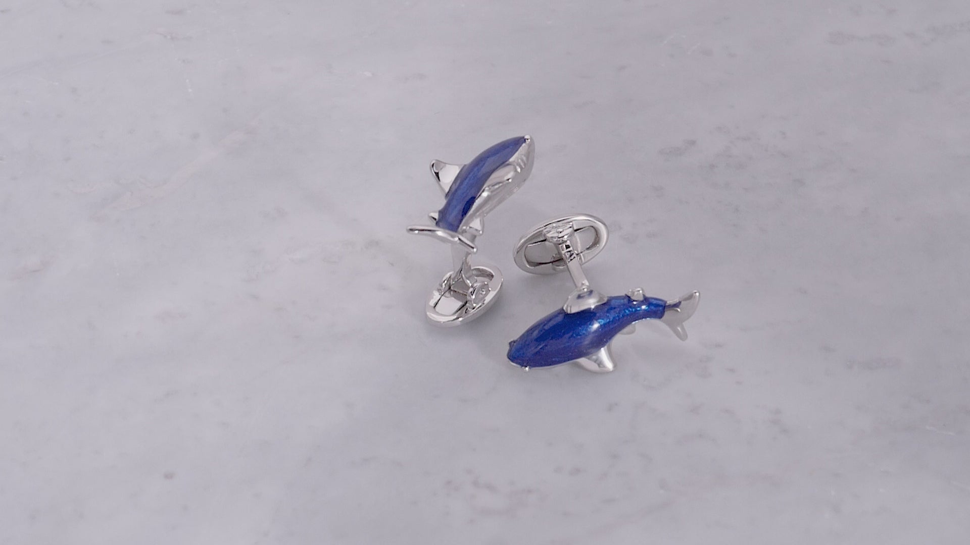 180 degree video of the circling Shark with Hand-painted Enamel & Sterling Silver Cufflinks in blue enamel. 